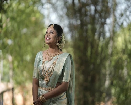 Indian woman in saree smiling